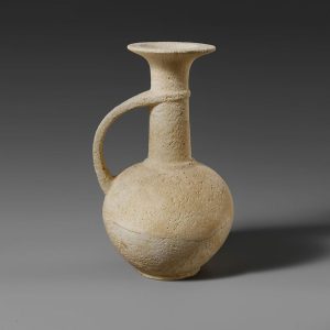 Limestone Head Of A Wreathed Youth