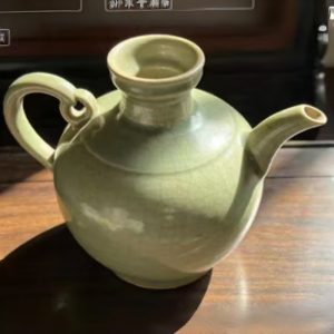 Celadon Jar Carved with Interlocking Lotus Scrolls